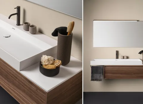 Modernes Badmöbel von Stocco mit großzügigem, weißem Waschtisch, Unterschrank in Nussbaumoptik und dekorativen Accessoires.